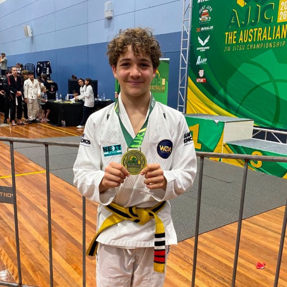 Gui with his medal from the kids division