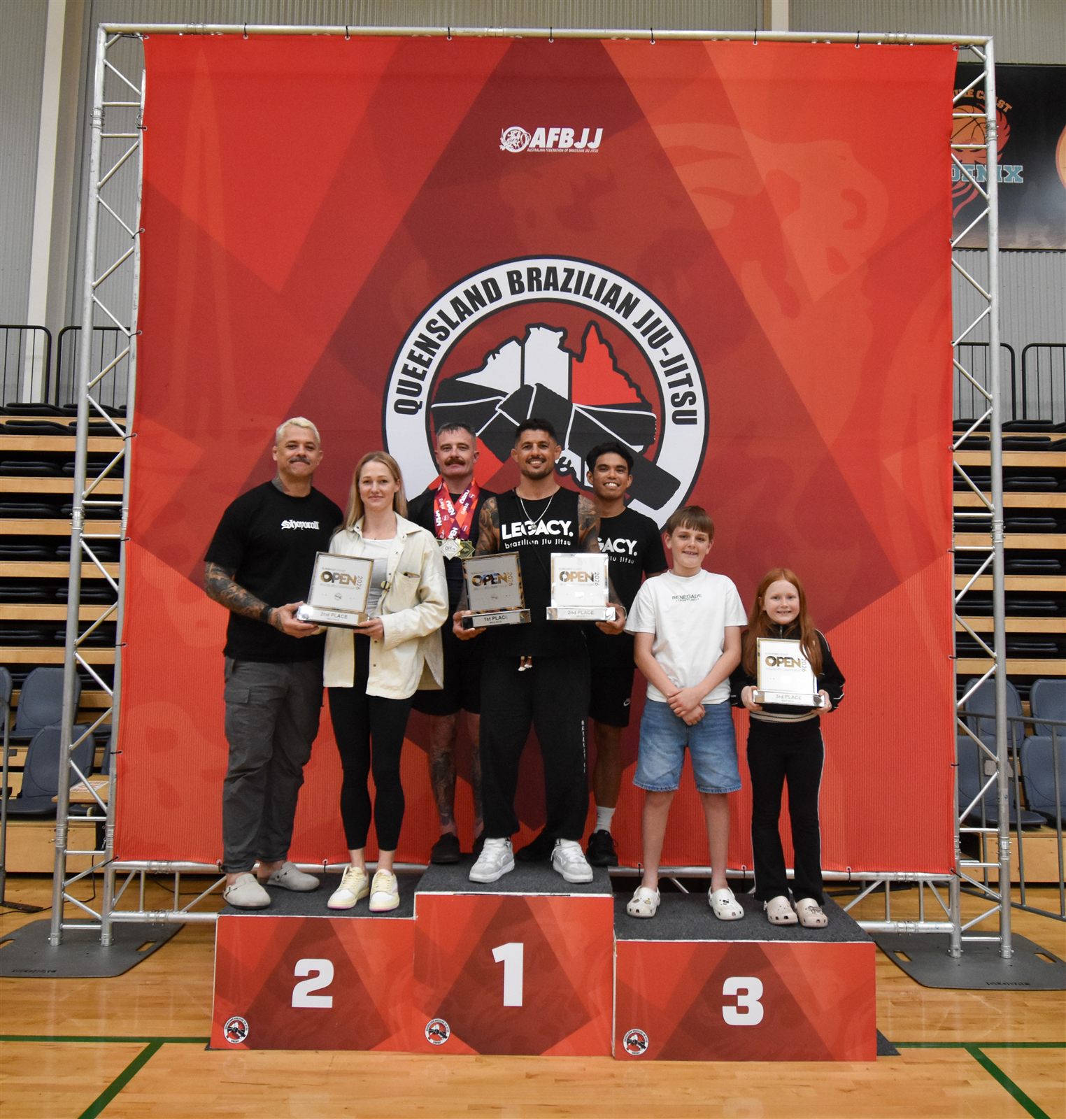 Legacy competitors and coaches on the podium at the Sunshine Coast Open 2026