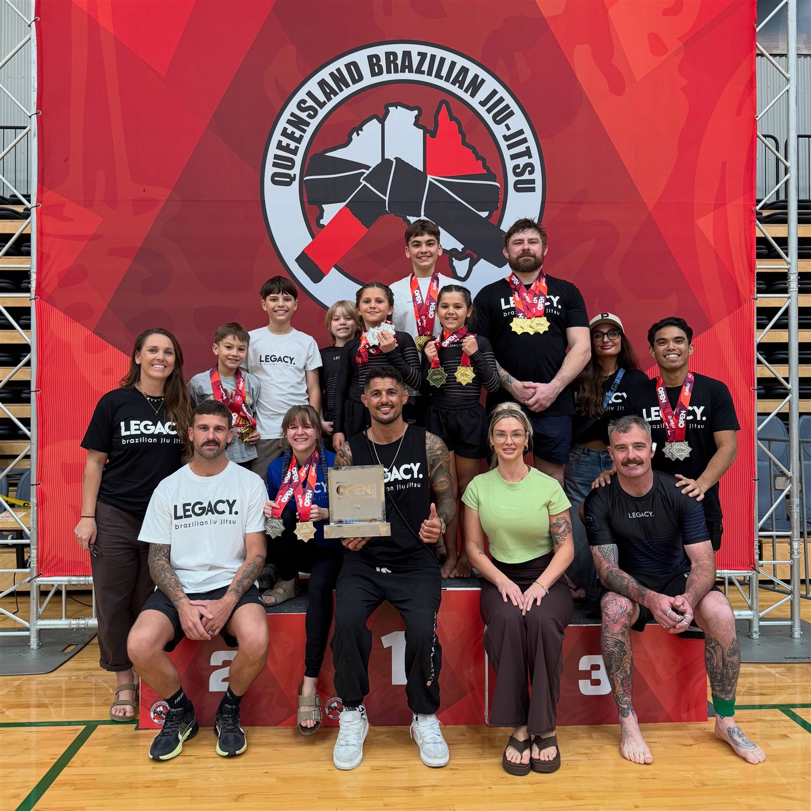 The Legacy Jiu Jitsu Sunshine Coast team together with their medals at the 2026 Sunshine Coast Open